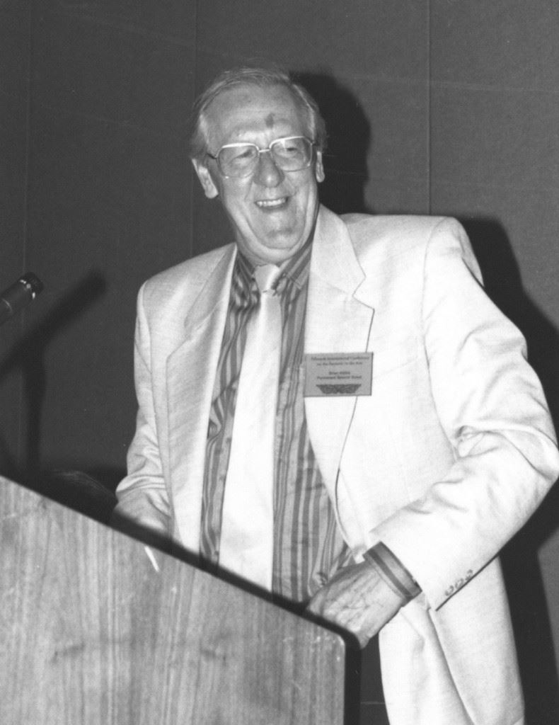 Brian W. Aldiss accepting the first IAFA Distinguished Scholarship Award, 1986, photo by Robert A. Collins, courtesy of FAU Special Collections, Robert A. Collins Collection